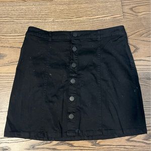 Forever21 - size Medium, black, mid-thigh, button up front skirt.